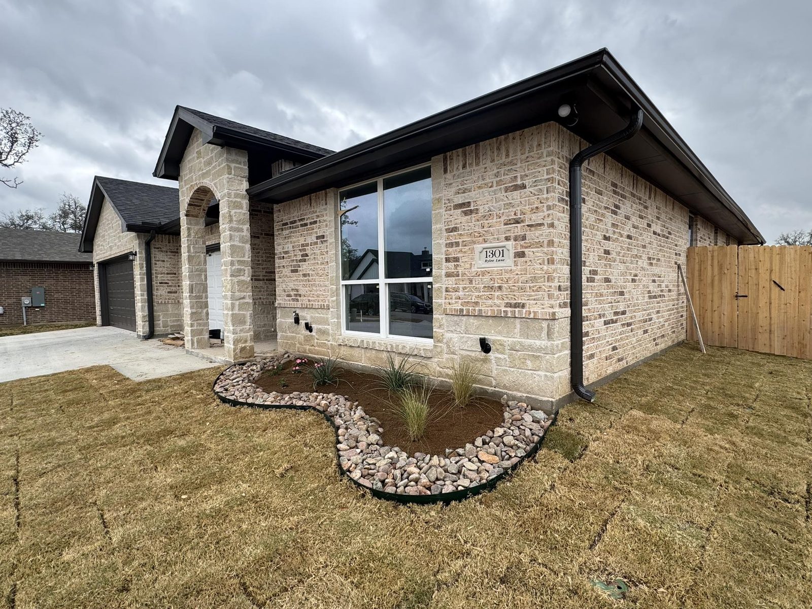 New Jubilee Homes construction at 1301 Rylee Lane, Drake’s Landing, Salado, Texas — stone and brick exterior